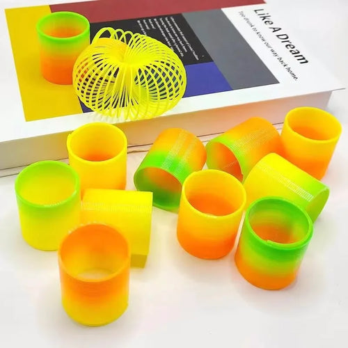 24PCS Rainbow Magic Springs Circle Toys Kids Birthday Party Favors