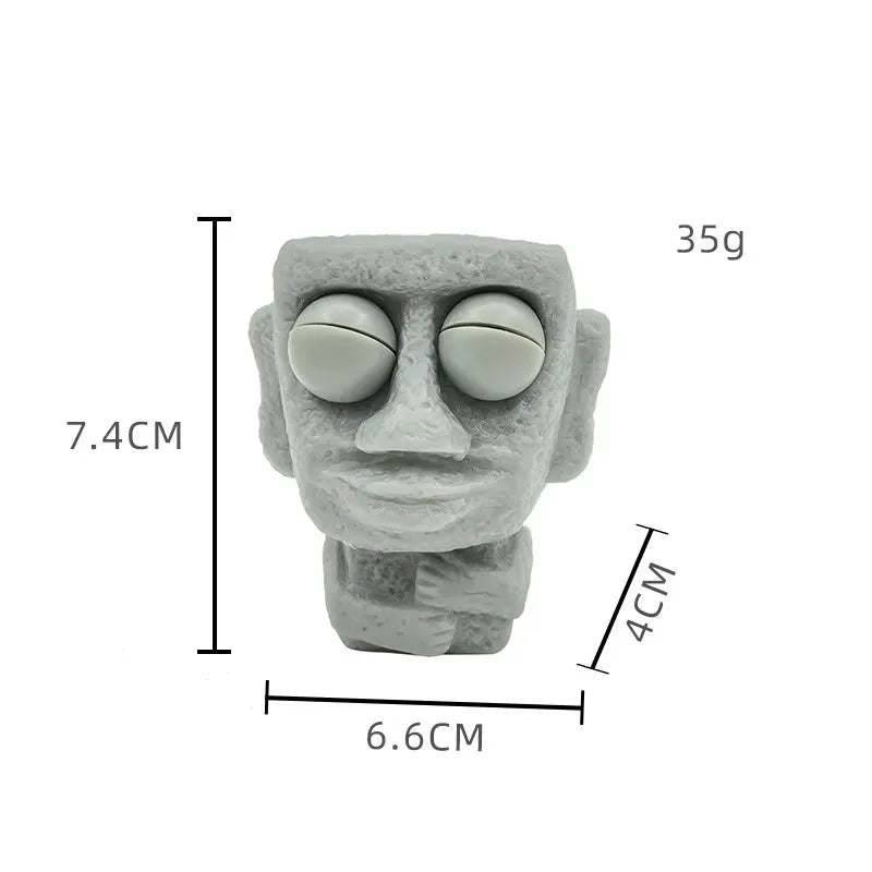 Stone man releases stress toy slowly rebounds soft Moai statue squeeze