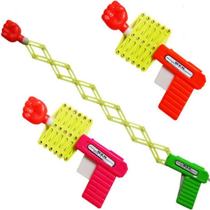 Retractable Fist Shooter Trick Toy Gun Funny Child Prank Toys Kids