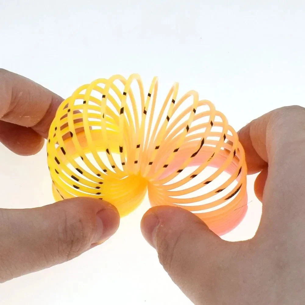 24PCS Rainbow Magic Springs Circle Toys Kids Birthday Party Favors