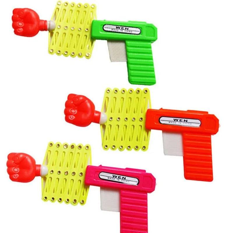 Retractable Fist Shooter Trick Toy Gun Funny Child Prank Toys Kids