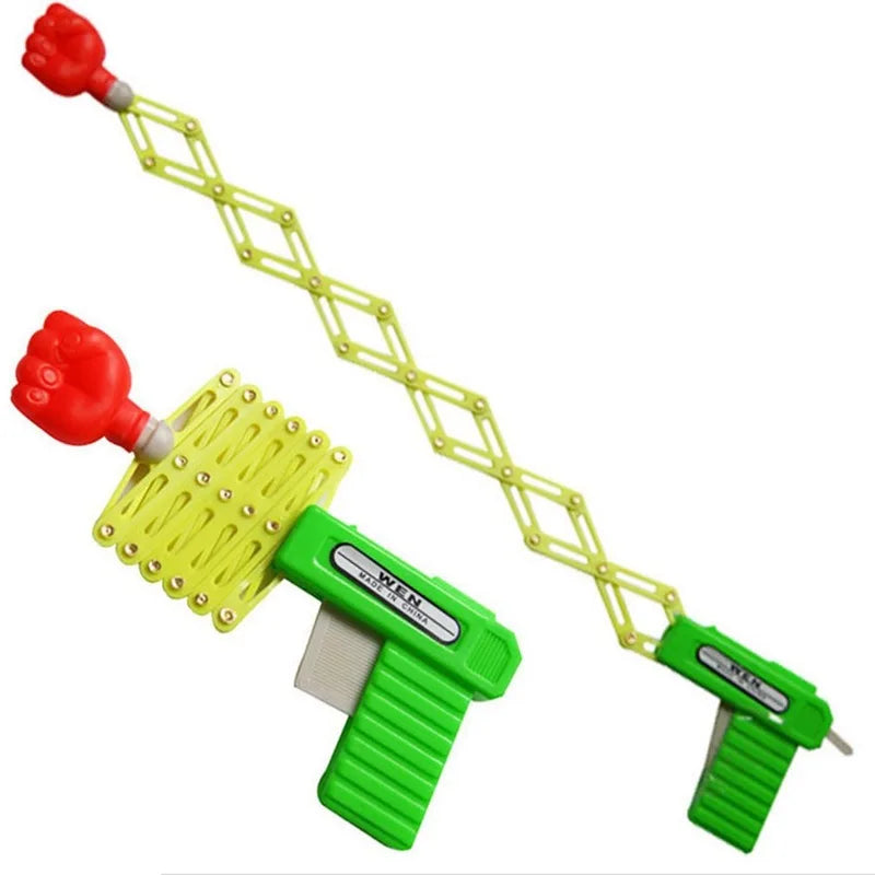 Retractable Fist Shooter Trick Toy Gun Funny Child Prank Toys Kids
