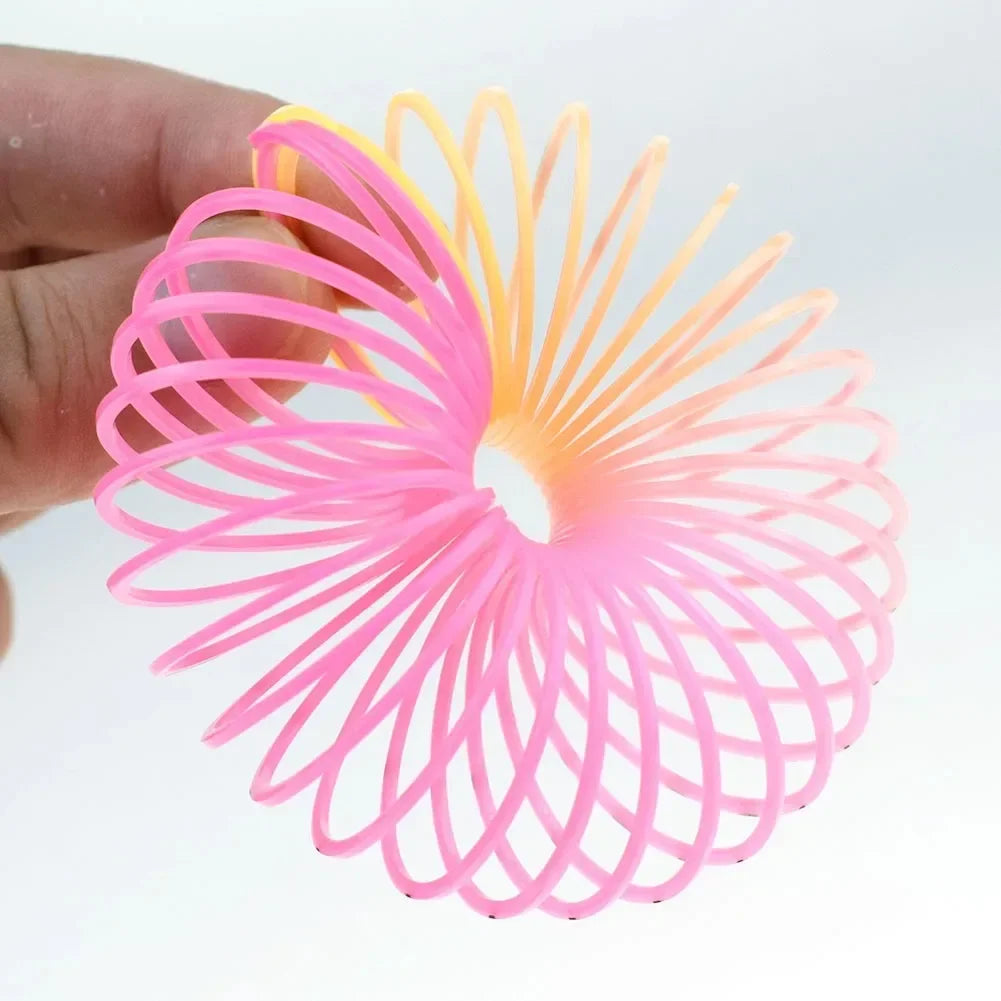 24PCS Rainbow Magic Springs Circle Toys Kids Birthday Party Favors
