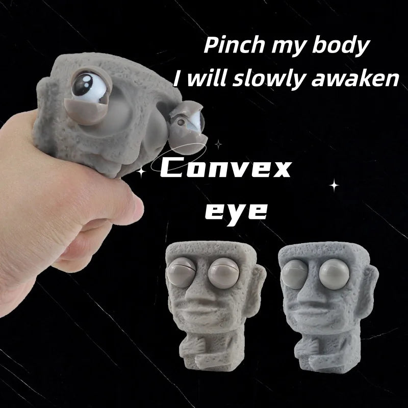 Stone man releases stress toy slowly rebounds soft Moai statue squeeze